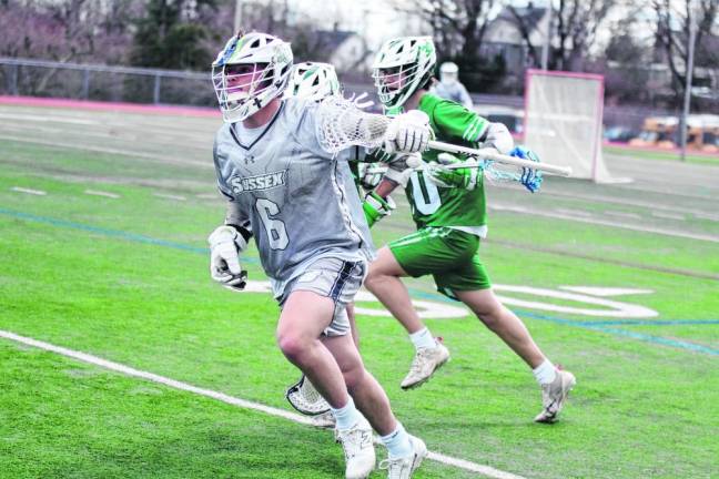 SCL2 Sussex County's Jeremiah Carfello is on the run with the ball.