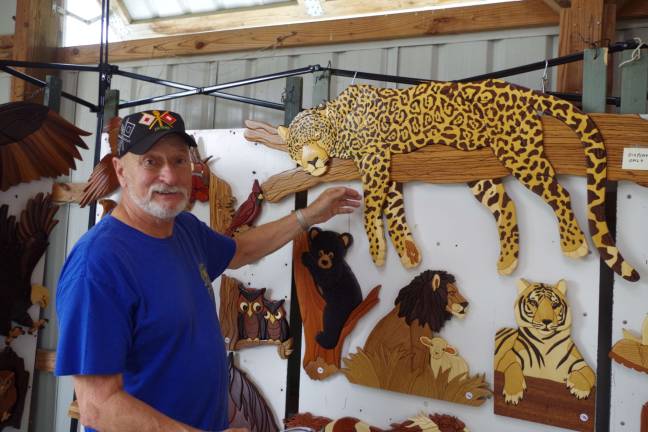Intarsia Wood Art by Hewitt-based artist George Carter caught the eye of many visitors. He uses domestic and exotic woods to create his wall art.