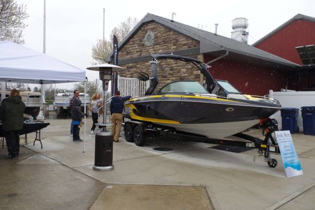 Despite a wet snowy afternoon, Jon and Matt Russo of Hewitt-based South Shore Marina brought a selection of speedboats and pontoon boat cruisers to the show.