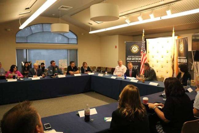 Congressmen lead panel on opioid abuse Photo provided Democratic Congressman Josh Gottheimer (NJ-5) and Republican Brian Fitzpatrick (PA-8) on Aug. 3 convened first responders, doctors, religious leaders, local elected officials and community leaders for a roundtable at Newton Medical Center