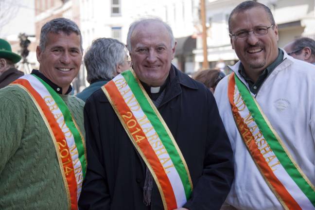 Newton goes green 2014 Grand Marshals Sean McGuire, Father Bill Collins, and Mike McGuire.