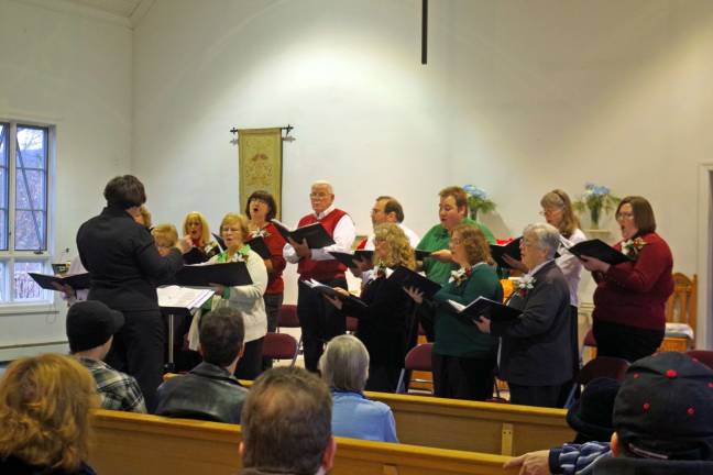 Choral Society performs at St. Thomas church The Community Choral Society is shown performing its annual winter concert at St. Thomas' Episcopal Church in downtown Vernon.