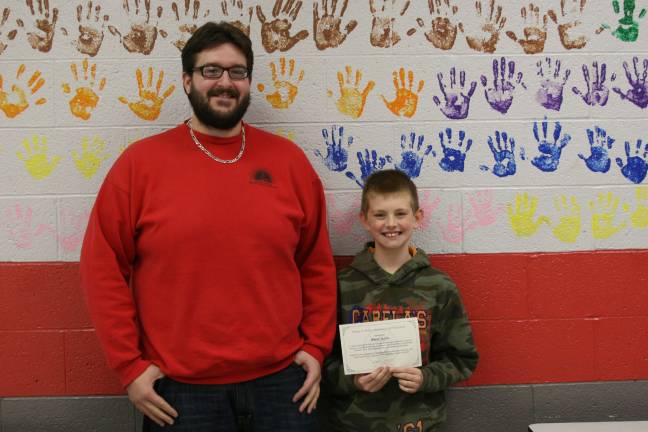 Local student wins leadership award Aaron Dunn, right, of Montague Elementary School was recently awarded a Leadership Ambassadorship by his teacher, Mr. Runne.