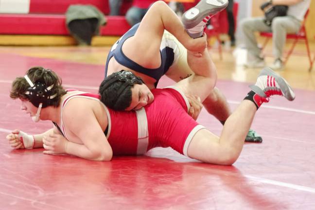 High Point's Andrew Lewis leg is bent by Roxbury's Jose Diaz in the 220 lbs match. Lewis won by decision 5-1.