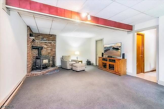Private splendor in intimate lake community 63 Beaver Run Road
