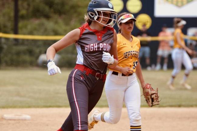 Freshman Karli Matthews rounds the bases.