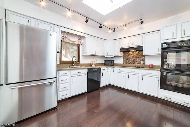 Lake Hopatcong home is set on 100 feet of shoreline Lake Hopatcong home is set on 100 feet of shoreline