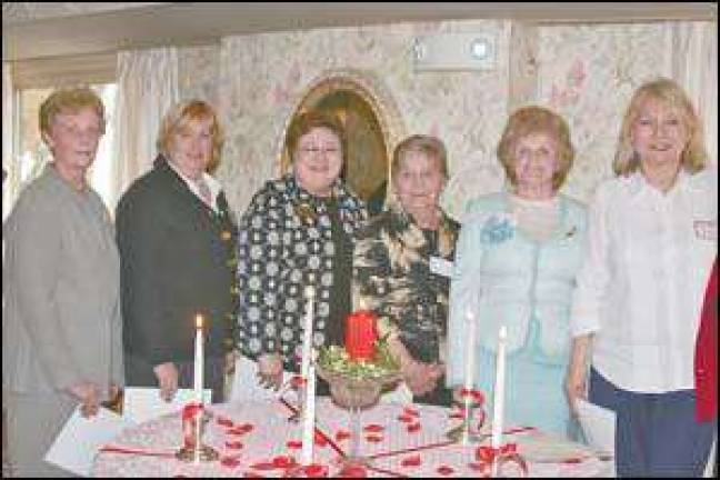 Woman's club installs officers Woman's club installs officers