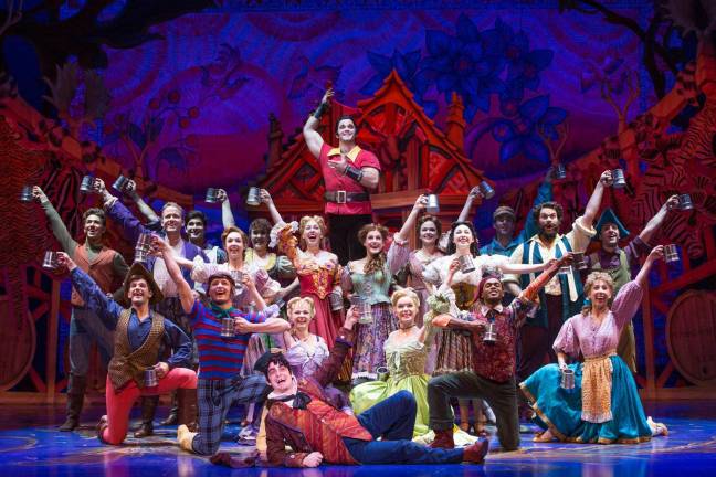 Disney's 'Beauty and the Beast' to grace the stage Photo credit Matthew Murphy Cameron Bond as Gaston and the cast of Disney's "Beauty and the Beast."