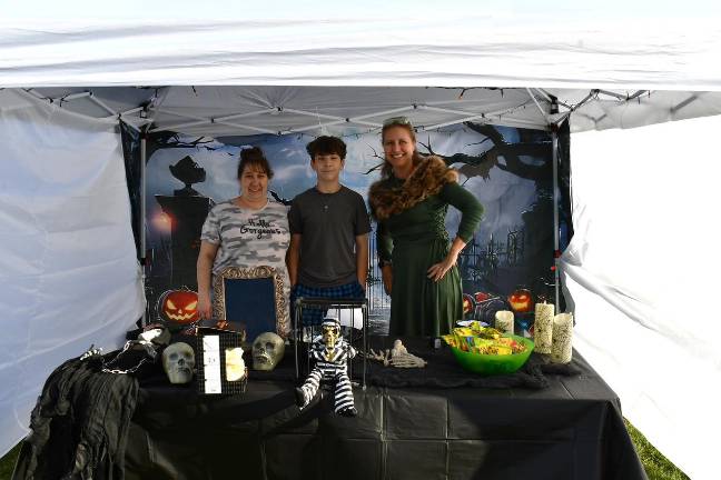 Vernon holds trick or trail event <b>Tracy and Aiden Bryan are shown with Kim White.</b>