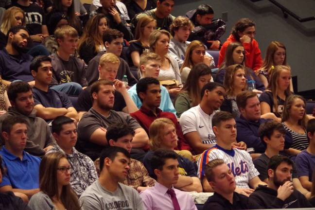 Students are shown in the audience during Mathew Maher&#xfe;&#xc4;&#xf4;s presentation at the high school.
