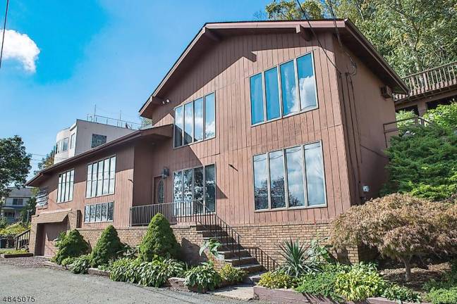 Lake Hopatcong home is set on 100 feet of shoreline Lake Hopatcong home is set on 100 feet of shoreline