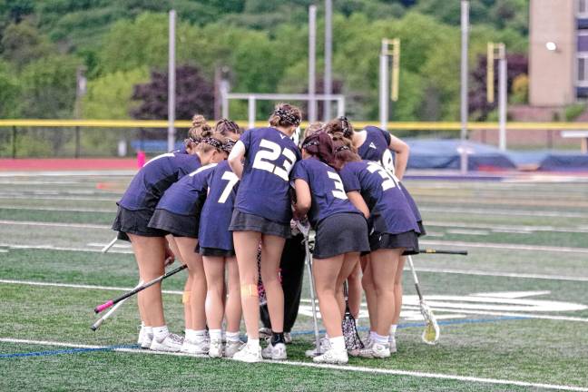 Sports roundup: Janus places 4th in state sectionals <b>The Vernon lacrosse team huddles before the game.</b>