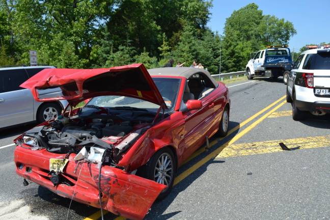The 17-year-old female that was driving this car and her two passengers were uninjured in Tuesday's afternoon accident. The vehicle crashed into five other vehicles and injured three. The driver was charged with careless driving.
