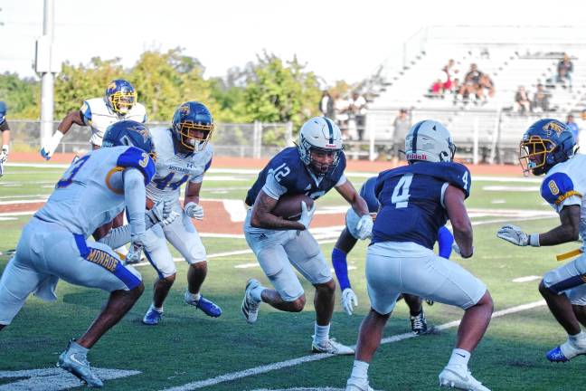 New era for SCCC football <b>Sussex Skylanders ball carrier Deondre Jones looks for running room.</b>
