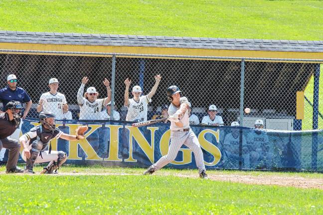 Photos: Vikings advance to semifinal <b>West Milford batter Brayden Primavera begins to swing the bat toward the incoming ball.</b>