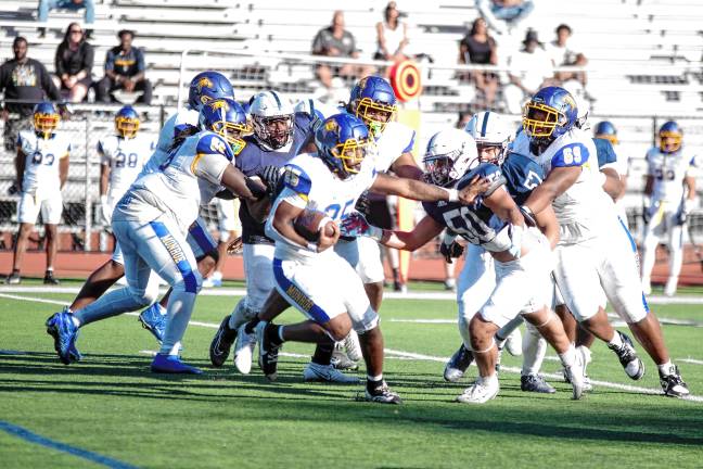 New era for SCCC football <b>Monroe ball carrier Jordan Leonard-Osbourne tries to avoid traffic on the field.</b>