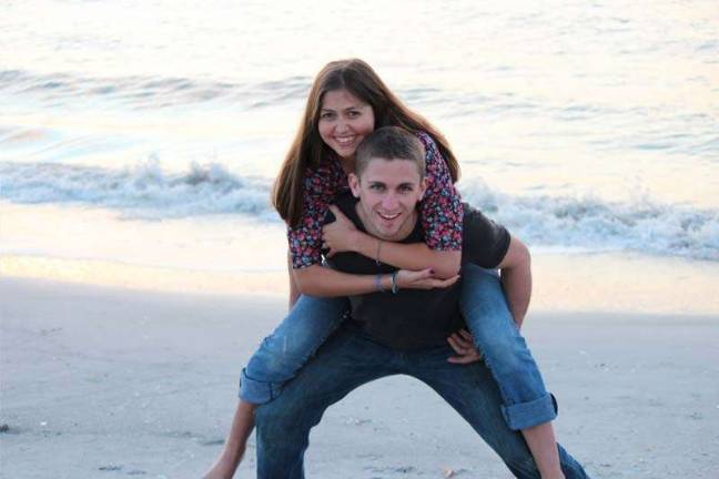 Love is in the air Lindsay Ruta of Sussex, N.J. "Fun in the sun. A walk along the shore."