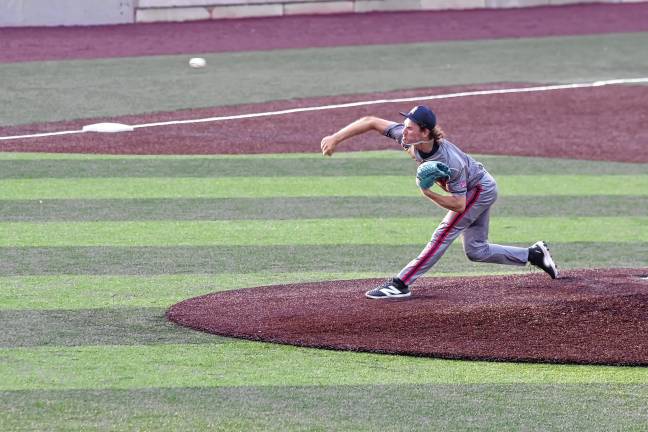 UPDATED: Miners make playoffs <b>Brockton Rox pitcher Michael Quigley throws the ball. He pitched for five innings.</b>