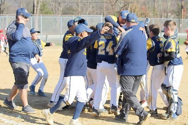 The Vernon Cyclones celebrate their tournament victory.