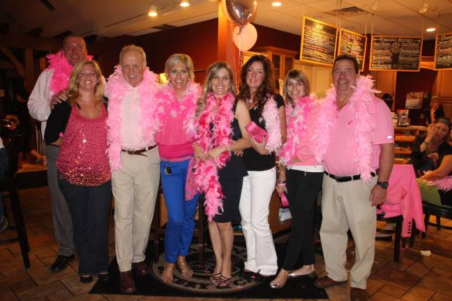 Breast cancer fundraiser held at Smokey's Drink for Pink-Avon for a Cure- Jay McVeigh,Kathleen Pockard, Smokey's Brick Oven owner Bruce Zaretsky, Jacqueline Boshart,Arlene LaSecla,Sue Caiafa-Roat, Jane and Chris Lennon.