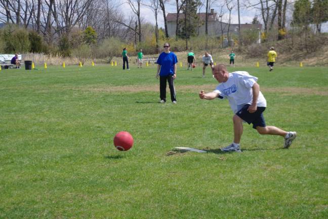 Hardyston Township Police Department Sergeant Ed O'Rourke is shown pitching in the Hardyston employees team versus Eastern Propane team kick ball contest. The longtime rival teams were at it once again with Eastern Propane winning the latest contest with a score of 6 to 4. O'Rourke scored the first home run for Hardyston.