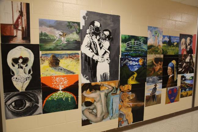 Hand painted murals line the walls outside of the Fine Arts classrooms of High Point painted by past and present students.