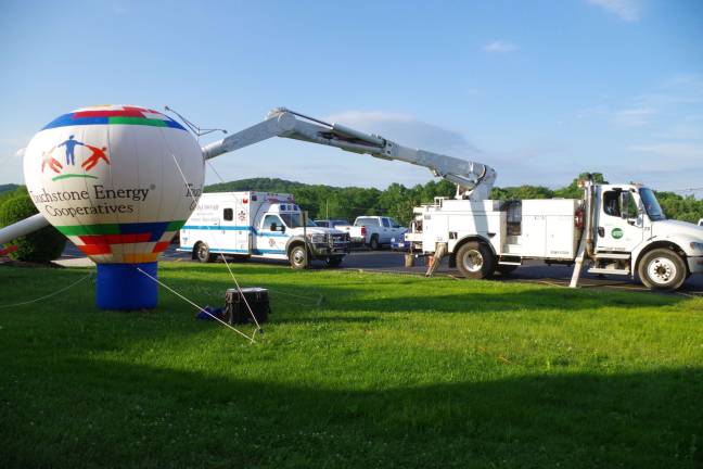 SREC holds annual meeting Sussex Rural Electric Cooperative gear on display in front of the High Point Regional High School in Wantage.