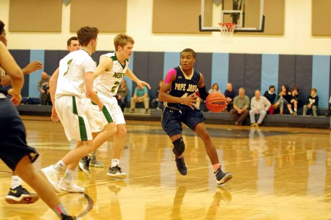 Pope John defeats N. Hunterdon on hardwood Pope John's Tahji Hooks handles the ball. Hooks scored three points and grabbed six rebounds.