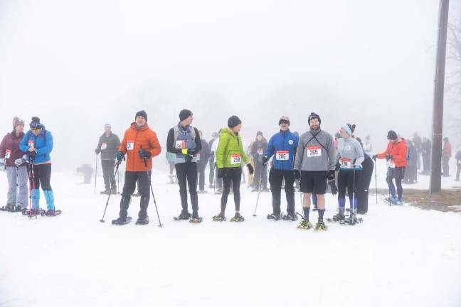 Competitors line up for the start of the race.