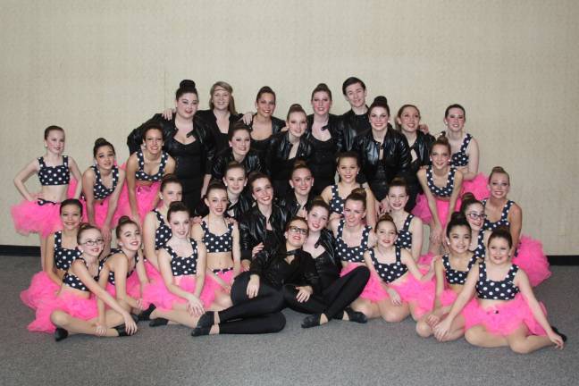Dance Expression earns high scores at Legacy competition The performers of "Grease" are shown.