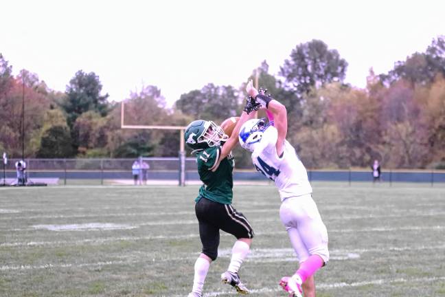 Wildcats claw Patriots, 35-6 <b>FB5 Sussex Tech wideout Anthony Caroleo (11) is unable to catch the ball as the pass is broken up by Kittatinny cornerback Vinny Falchetta in the first half.</b>
