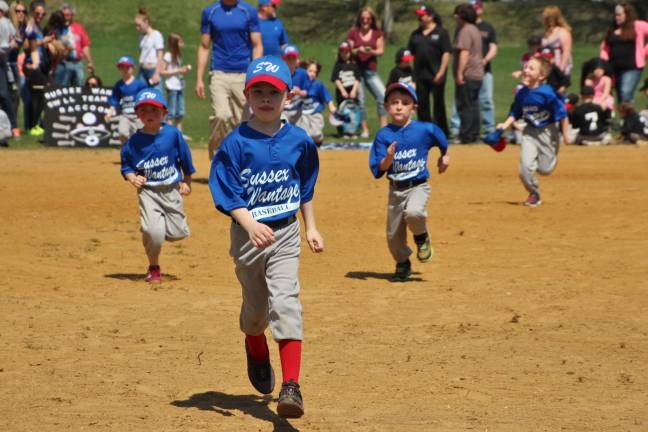 The Blue Sharks hustle to claim prize for winning banner in T-Ball