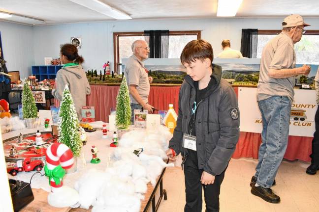 Photos: Holiday Train Display Nicholas Phillips of Hardyston looks at a display.