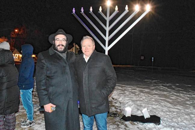 Photos: Menorah lighting in Vernon <b>Vernon Mayor Anthony Rossi poses with Rabbi Mendel Dubov, director of Chabad in Sussex County, at the township’s menorah lighting Thursday, Dec. 26. (Photos by Maria Kovic)</b>