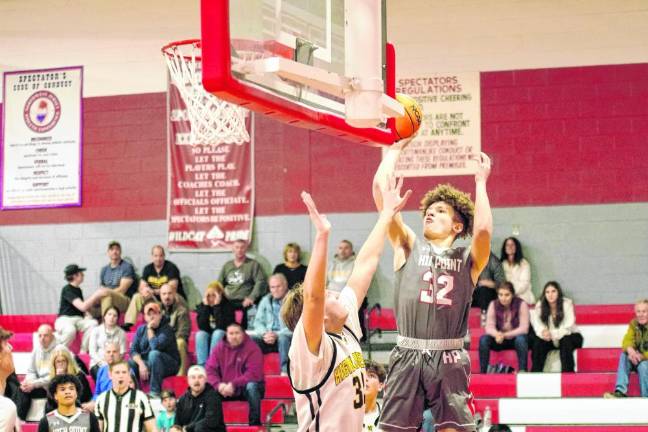 High Point's Kyle Willis (32) attempts a shot in the game Feb. 21. The Wildcats defeated West Milford, 51-47, in the first round of the NJSIAA North Jersey, Section 1, Group 2 tournament. (Photos by George Leroy Hunter)