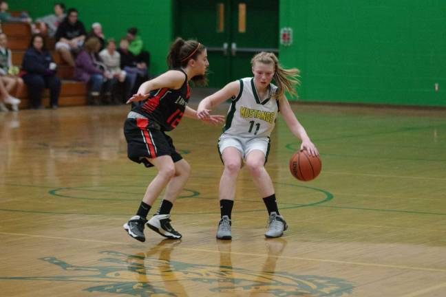 Sussex Tech's Karleigh Noll dribbles the ball while covered by Hackettstown's Raina Cerniglia.