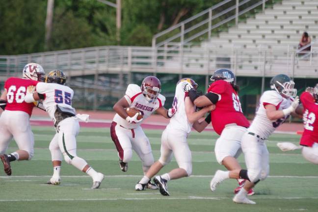 Local football players compete in all-star classic West running back Trey Gwynn (Morristown) with the ball.