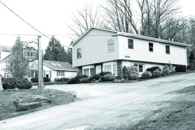 Where in responses People who identified themselves as Brendan & Margery Talbot and Julie and Rich Koop, Sr., knew last week's photo was the general dentistry practice of David Langer, D.M.D. is located on Route 94, south of the Main Street intersection.
