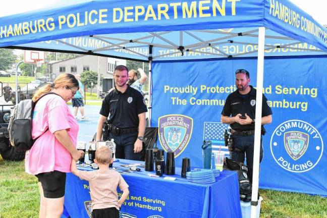 Photos: National Night Out in Sussex County Residents talk to Hamburg police officers during the National Night Out event Tuesday, Aug. 5 in Franklin.