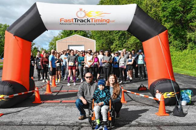 Photos: Vernon Spring 5K <b>Benny Torres; his mother, Viviana Florea; and her fiance, Chris Fritter, pose before the Vernon Spring 5K begins Saturday, May 24 at Maple Grange Park. Proceeds of the race will help Benny beat brain cancer. </b>
