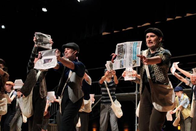 The scoop on “Newsies” at Sparta High School Sparta High School students (and a copy of <i>Sparta Independent</i>) rehearse for this weekend’s production.