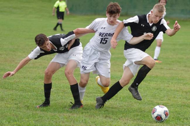 Rangers edge Vikings, 4-3 Wallkill Valley's Tony Ciapara and Skylar Hanisch try to box in Vernon's Nolan Shade while pursuing the ball.