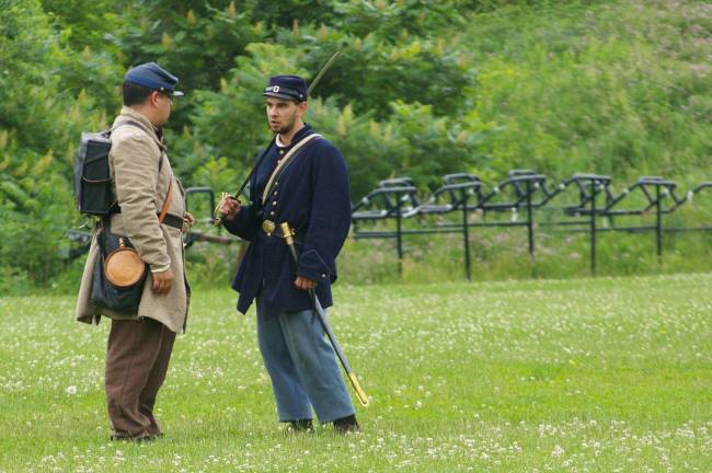 PHOTOS BY CHRIS WYMAN Vernon residents Brian Schade and Steve Moldovany were the battalion commanders during the Gettysburg Picket's Charge Civil War reenactment held at the high school.