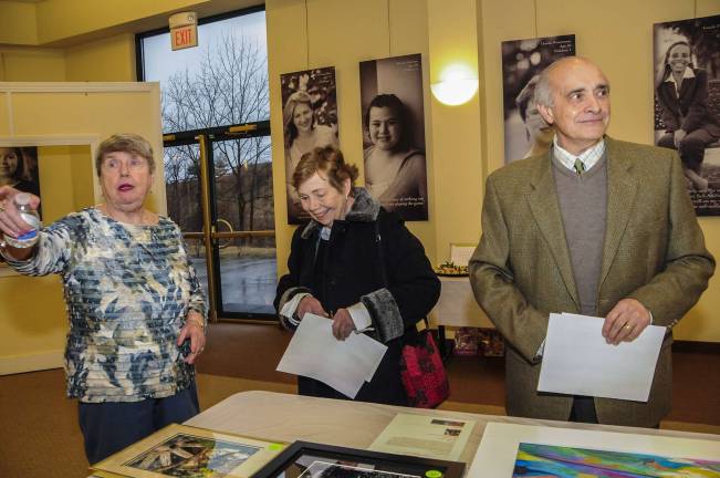 Locals bring color to Sussex County (L-R) Mary Jo Mathias of Byram, Drector of the Sussex Country Arts and Heritage Council, Eileen Fontana and husband Richard formerly from Sparta at the First Annual "Color Your World" Art Auction.
