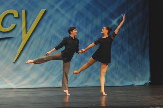 Dance Expression earns high scores at Legacy competition Dylan VinderLong of Vernon, left, and Renea Rossi of Vernon compete.