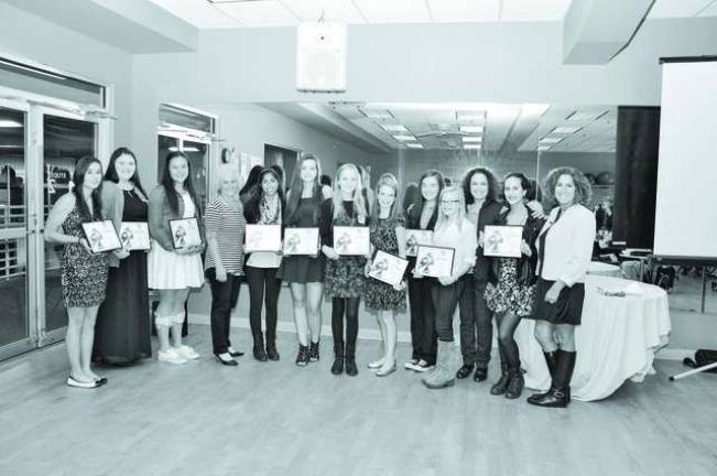 The 10 girls of merit winners with Publisher of Straus News Jeanne Straus and Varinda Missett, President of Girls World Expo.