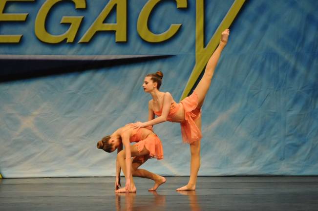 Dance Expression earns high scores at Legacy competition Jillian Henderson of Sparta and Kristina Henderson of Wantage perform.