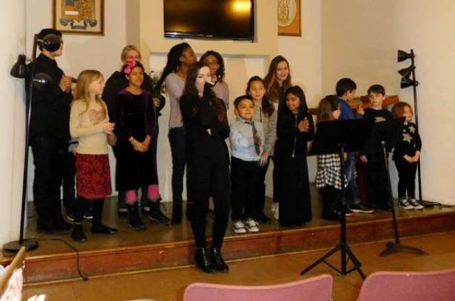 All the performers at the workshop&#xfe;&#xc4;&#xb6;Alexa L. is third from the left.