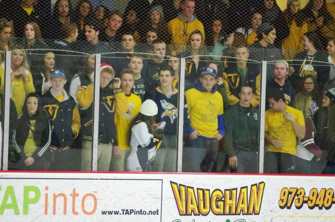 Vernon Vikings fans watch the action on the ice.